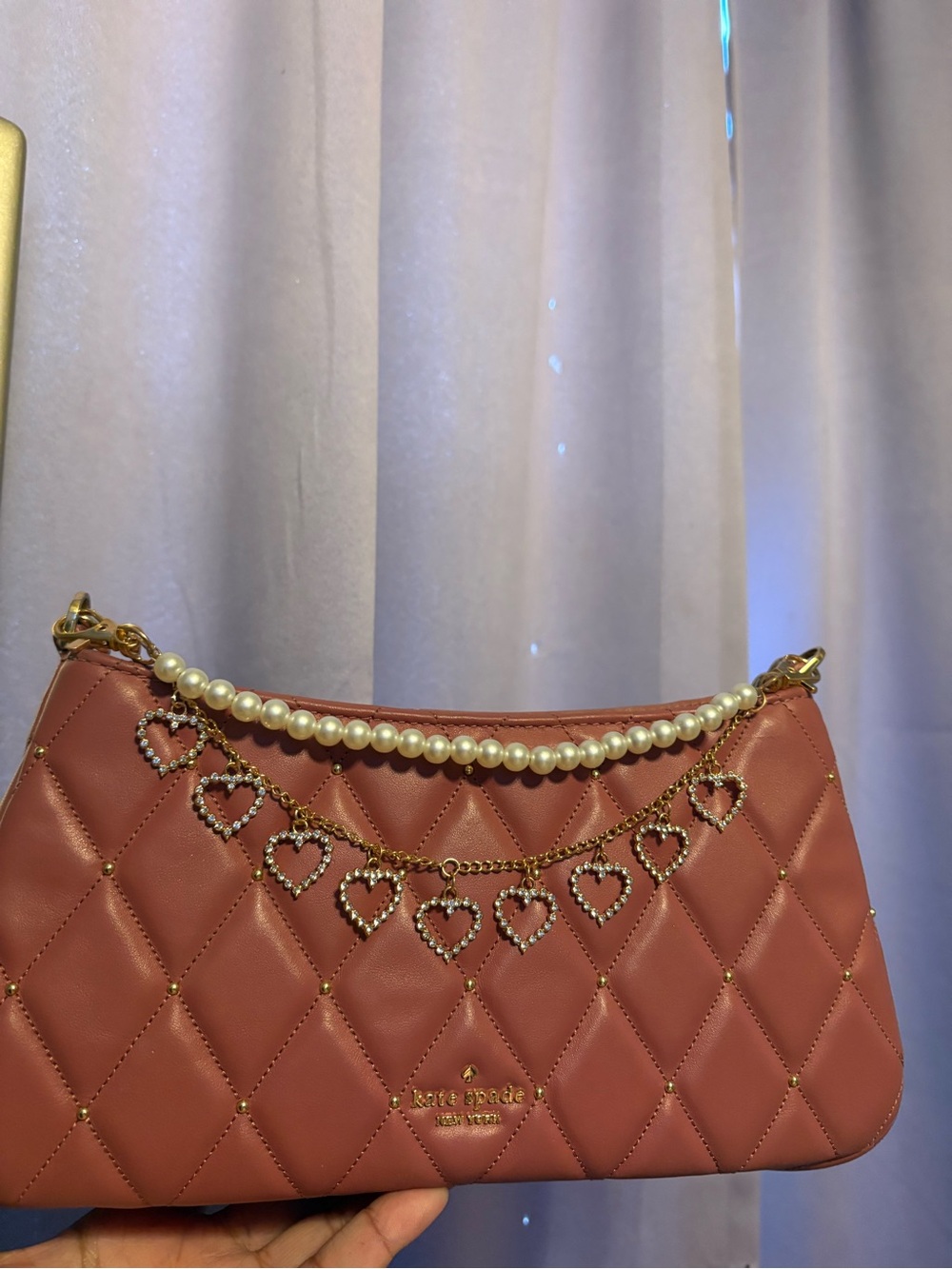 Pearl chain with heart charms